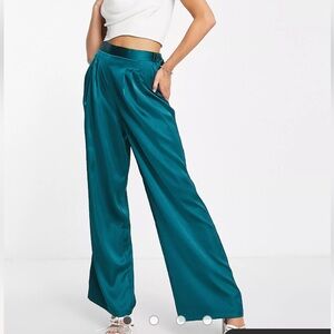 ASOS DESIGN satin pants with pleat detail in pine green